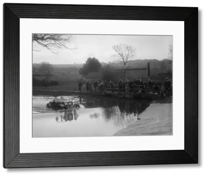 Framed Print : 972 cc Singer Le Mans driving through a ford during a motoring trial, 1936. Artist: Bill Brunell Framed Print : 972 cc Singer Le Mans driving through a ford during a motoring trial, 1936. Artist: Bill Brunell