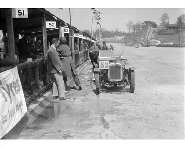 Austin Ulster of ECH Randall and WE Harker in the pits, JCC Double Twelve race, Brooklands, 1931