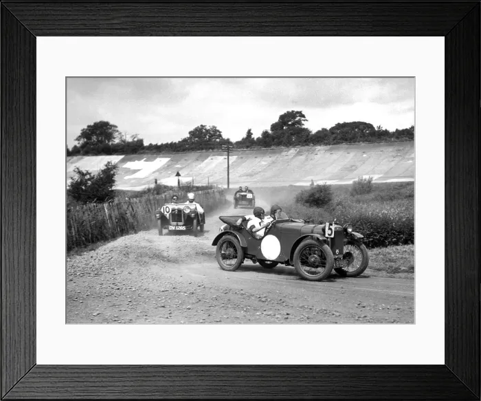 Framed Print : Two Austin Ulsters leading an MG, JCC Members Day, Brooklands, 4 July 1931. Artist: Bill Brunell Framed Print : Two Austin Ulsters leading an MG, JCC Members Day, Brooklands, 4 July 1931. Artist: Bill Brunell