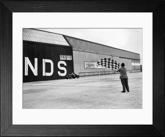 Framed Print : Waving the chequered flag at Brooklands, 1938 or 1939. Artist: Bill Brunell Framed Print : Waving the chequered flag at Brooklands, 1938 or 1939. Artist: Bill Brunell