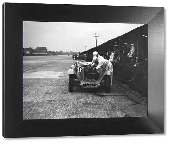Alfa Romeo of KD Evans in the pits at the JCC Members Day, Brooklands, 4 July 1931