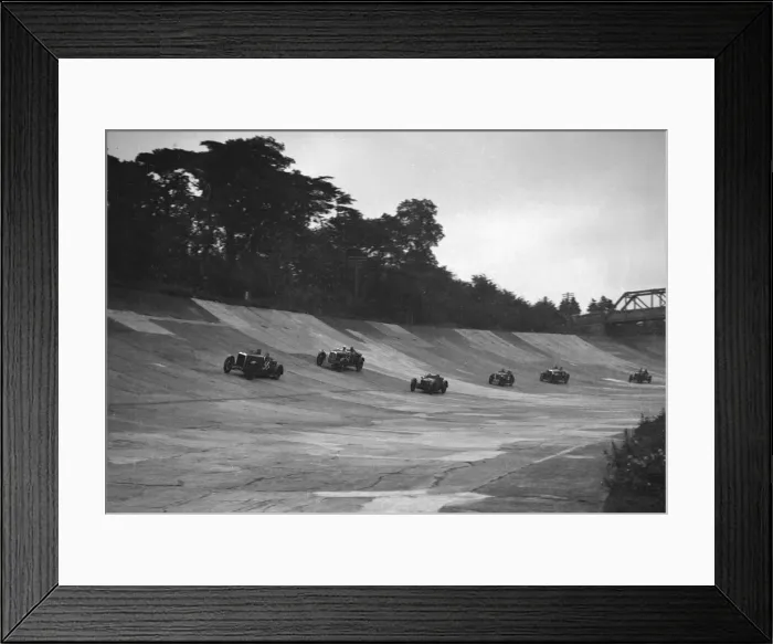 Framed Print : Cars racing on the banking at a JCC Members Day, Brooklands. Artist: Bill Brunell Framed Print : Cars racing on the banking at a JCC Members Day, Brooklands. Artist: Bill Brunell