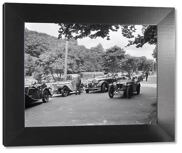 Cars competing in the MCC Torquay Rally, July 1937. Artist: Bill Brunell