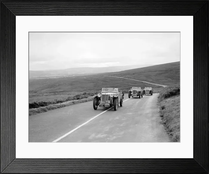 Framed Print : Three MG TAs competing at the MCC Torquay Rally, July 1937. Artist: Bill Brunell Framed Print : Three MG TAs competing at the MCC Torquay Rally, July 1937. Artist: Bill Brunell