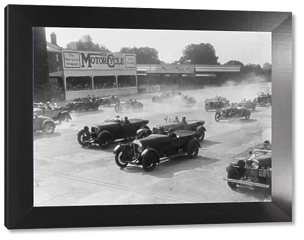 Talbot 105 tourer, Bentley and Lagonda racing at a MCC meeting, Brooklands, Surrey, 1933