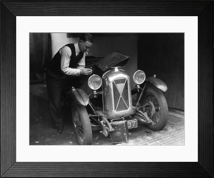 Framed Print : Geoffrey Baker working on a Salmson 1090cc car. Artist: Bill Brunell Framed Print : Geoffrey Baker working on a Salmson 1090cc car. Artist: Bill Brunell