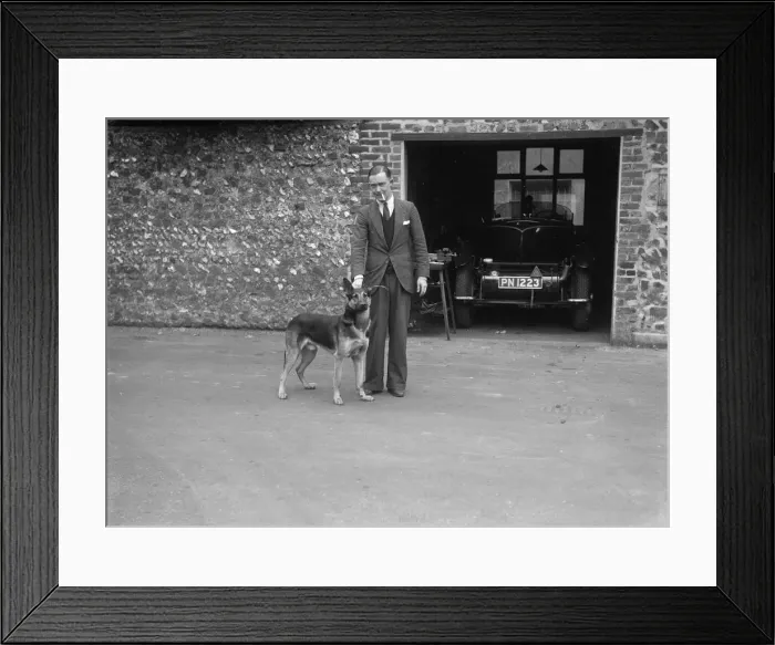 Framed Print : Geoffrey Baker standing in front of a Minerva 5954 cc car. Artist: Bill Brunell Framed Print : Geoffrey Baker standing in front of a Minerva 5954 cc car. Artist: Bill Brunell