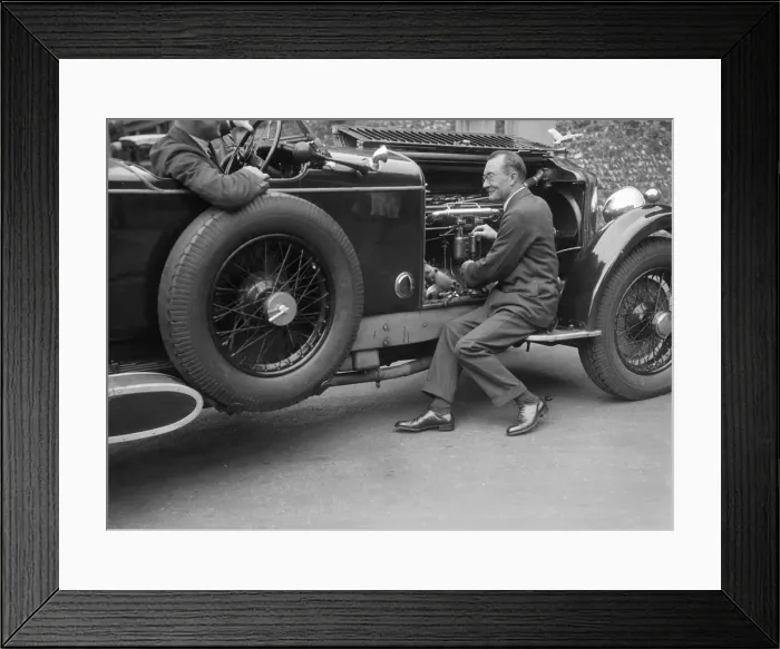 Framed Print : Geoffrey Baker inspecting the engine of a Minerva car. Artist: Bill Brunell Framed Print : Geoffrey Baker inspecting the engine of a Minerva car. Artist: Bill Brunell