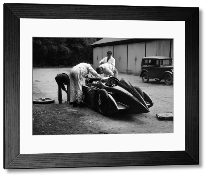 Framed Print : Mechanics working on Leon Cushmans Austin 7 racer for a speed record attempt, Brooklands, 1931 Framed Print : Mechanics working on Leon Cushmans Austin 7 racer for a speed record attempt, Brooklands, 1931