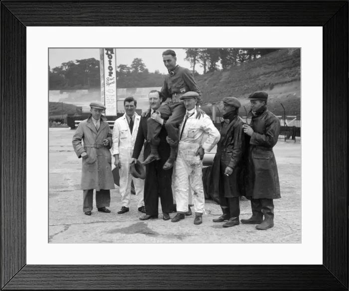 Framed Print : Leon Cushman being carried aloft after making a successful speed record attempt, Brooklands, 1931 Framed Print : Leon Cushman being carried aloft after making a successful speed record attempt, Brooklands, 1931