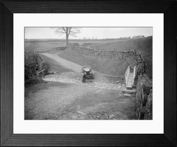 Framed Print : Kitty Brunell road testing a MG 18 / 80, Tan Hill, Yorkshire, April 1931. Artist: Bill Brunell Framed Print : Kitty Brunell road testing a MG 18 / 80, Tan Hill, Yorkshire, April 1931. Artist: Bill Brunell