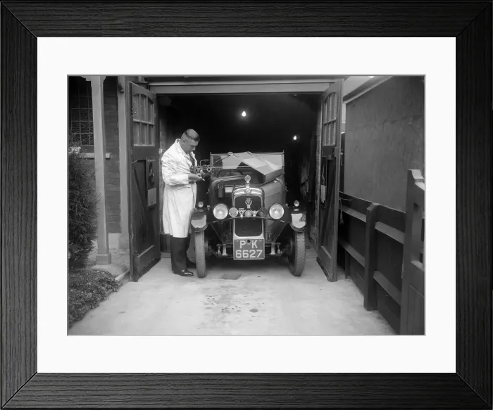 Framed Print : FA Thatcher working on his 1929 Triumph Super Seven. Artist: Bill Brunell Framed Print : FA Thatcher working on his 1929 Triumph Super Seven. Artist: Bill Brunell
