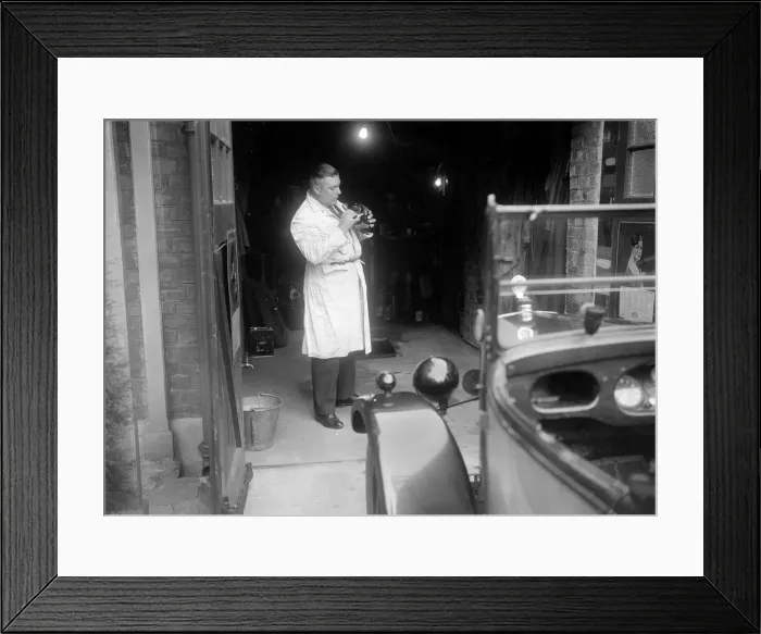 Framed Print : FA Thatcher working on his 1929 Triumph Super Seven. Artist: Bill Brunell Framed Print : FA Thatcher working on his 1929 Triumph Super Seven. Artist: Bill Brunell