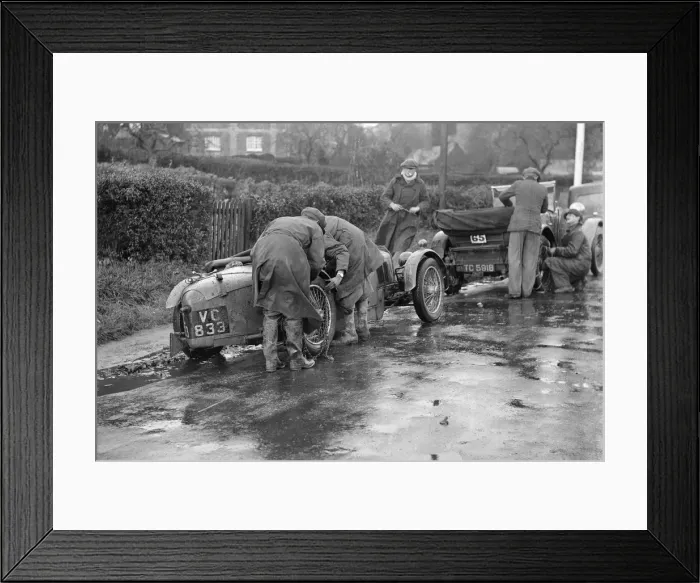 Framed Print : Attaching snow chains to JE Lancasters Riley Brooklands during the Inter-Varsity Trial, 1930 Framed Print : Attaching snow chains to JE Lancasters Riley Brooklands during the Inter-Varsity Trial, 1930