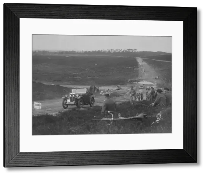 Framed Print : 1931 Morris Minor open 2-seater competing in a motoring trial, Bagshot Heath, Surrey, 1930s Framed Print : 1931 Morris Minor open 2-seater competing in a motoring trial, Bagshot Heath, Surrey, 1930s