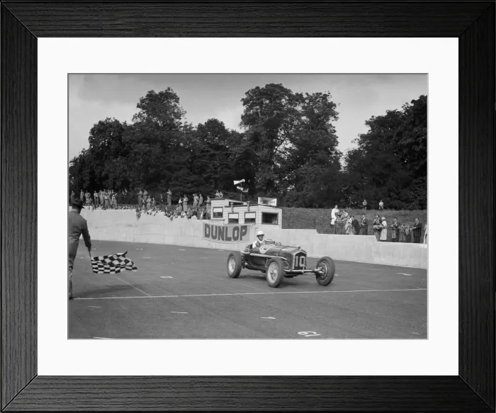 Framed Print : Alfa Romeo of Kenneth Evans taking the chequered flag at Crystal Palace, 1939. Artist: Bill Brunell Framed Print : Alfa Romeo of Kenneth Evans taking the chequered flag at Crystal Palace, 1939. Artist: Bill Brunell