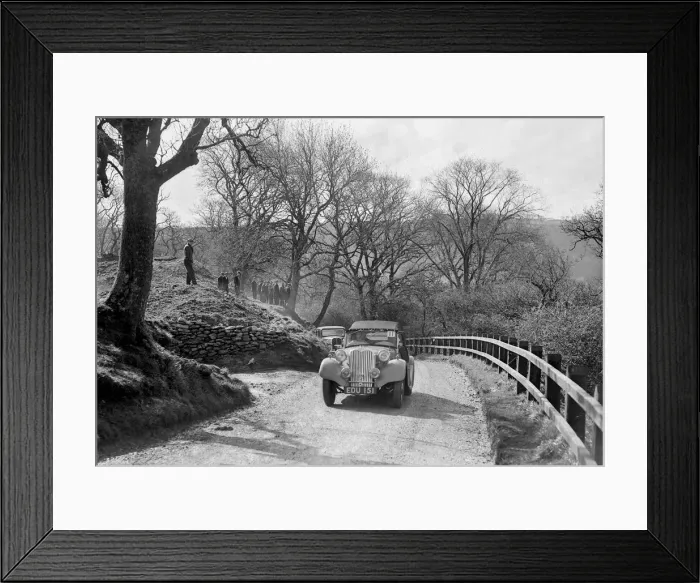 Framed Print : Kay Petres Singer Nine competing in the RAC Rally, 1939. Artist: Bill Brunell Framed Print : Kay Petres Singer Nine competing in the RAC Rally, 1939. Artist: Bill Brunell