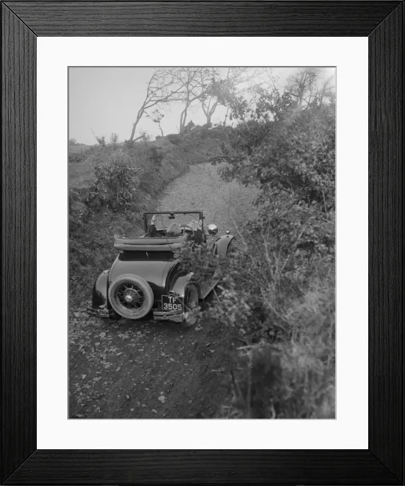 Framed Print : Kitty Brunell driving a 1930 2-seater Ford Model A, 1931. Artist: Bill Brunell Framed Print : Kitty Brunell driving a 1930 2-seater Ford Model A, 1931. Artist: Bill Brunell