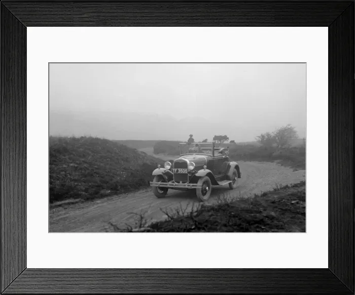 Framed Print : Kitty Brunell driving a 1930 2-seater Ford Model A, 1931. Artist: Bill Brunell Framed Print : Kitty Brunell driving a 1930 2-seater Ford Model A, 1931. Artist: Bill Brunell