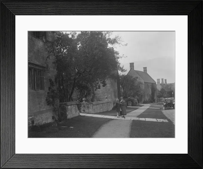 Framed Print : Unidentified 4-seater tourer in a village, c1920s. Artist: Bill Brunell Framed Print : Unidentified 4-seater tourer in a village, c1920s. Artist: Bill Brunell