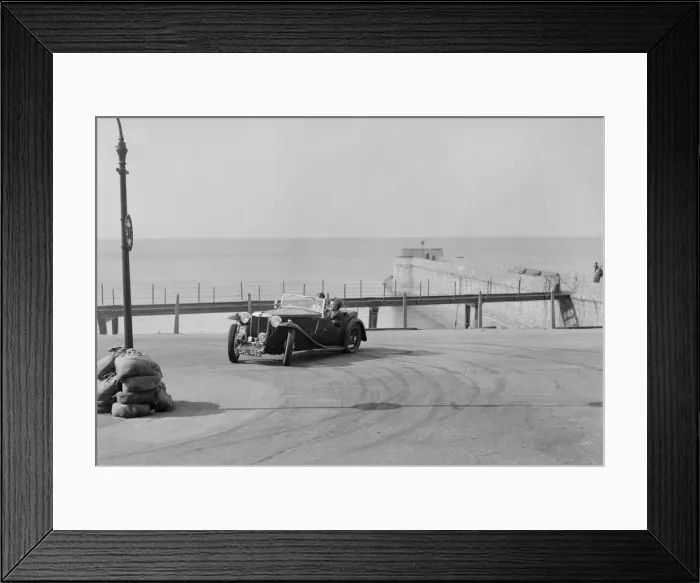 Framed Print : MG TA of FG Cornish competing in the RAC Rally, Madeira Drive, Brighton, 1939. Artist: Bill Brunell Framed Print : MG TA of FG Cornish competing in the RAC Rally, Madeira Drive, Brighton, 1939. Artist: Bill Brunell