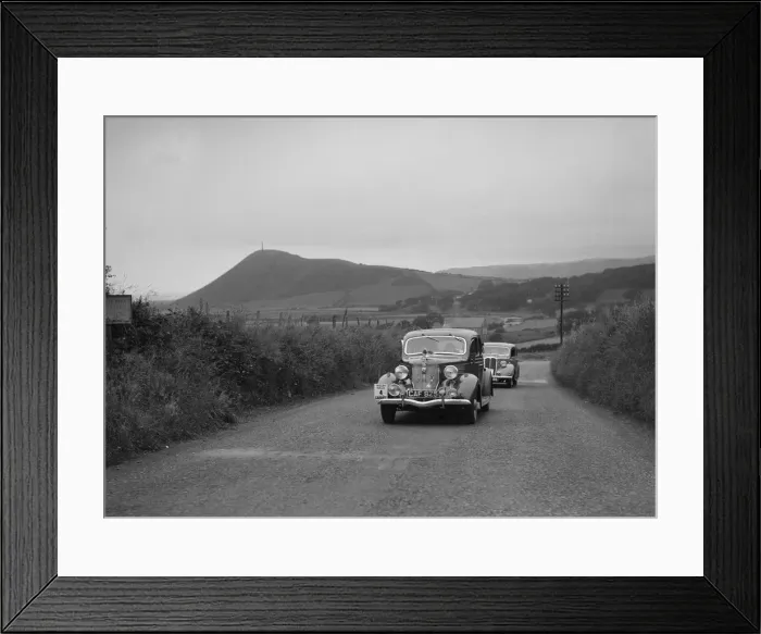 Framed Print : Ford V8 saloon of HJ Parsons competing in the South Wales Auto Club Welsh Rally, 1937 Artist Framed Print : Ford V8 saloon of HJ Parsons competing in the South Wales Auto Club Welsh Rally, 1937 Artist