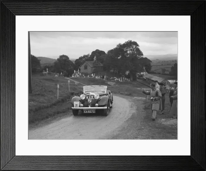 Framed Print : Jensen open 4-seater of Ken Crawford competing in the South Wales Auto Club Welsh Rally Framed Print : Jensen open 4-seater of Ken Crawford competing in the South Wales Auto Club Welsh Rally