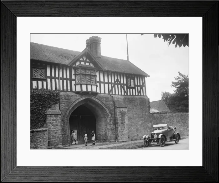 Framed Print : Singer 10 hp open 2-seater by the gatehouse of Stokesay Castle, Shropshire, 1920s Framed Print : Singer 10 hp open 2-seater by the gatehouse of Stokesay Castle, Shropshire, 1920s