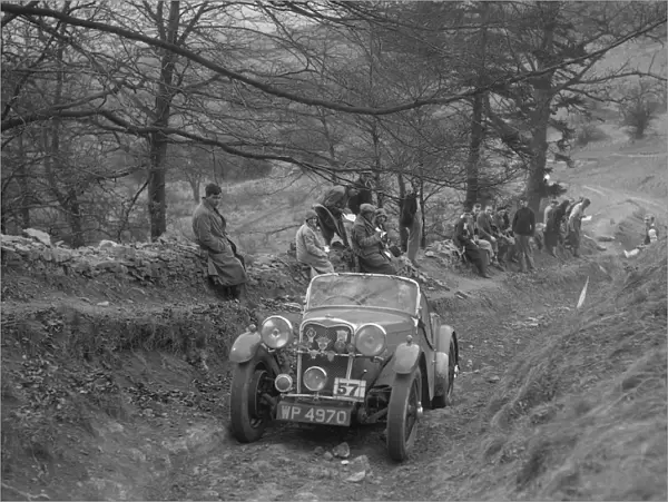 Singer Le Mans competing in the MG Car Club Abingdon Trial  /  Rally, 1939. Artist: Bill Brunell
