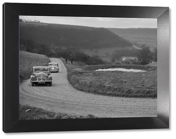 Rover of BN Wilmott and Jaguar SS of Dr AR Gray competing in the RAC Rally, 1939