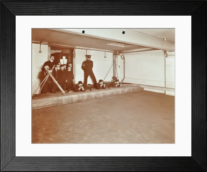 Framed Print : Rifle shooting lesson, Jews Free School, Stepney, London, 1908 Framed Print : Rifle shooting lesson, Jews Free School, Stepney, London, 1908