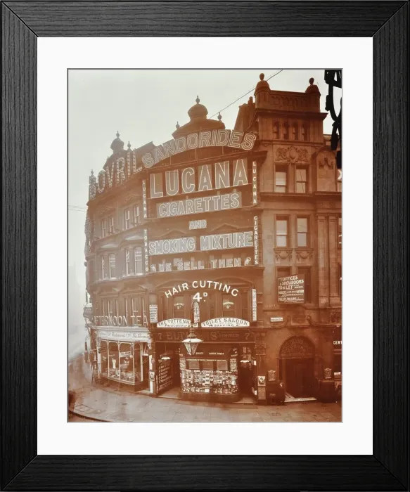 Framed Print : Illuminated advertisements on shop fronts at 7, Oxford Street, London, 1909 Framed Print : Illuminated advertisements on shop fronts at 7, Oxford Street, London, 1909