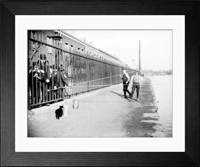 Framed Print : Boys fishing across a canal towpath, London, c1905 Framed Print : Boys fishing across a canal towpath, London, c1905