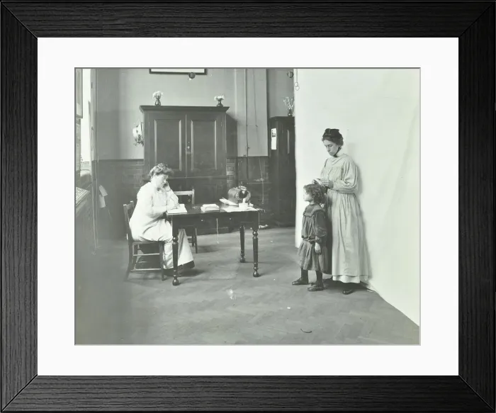 Framed Print : School nurse examining girls hair for head lice, Chaucer School, London, 1911 Framed Print : School nurse examining girls hair for head lice, Chaucer School, London, 1911