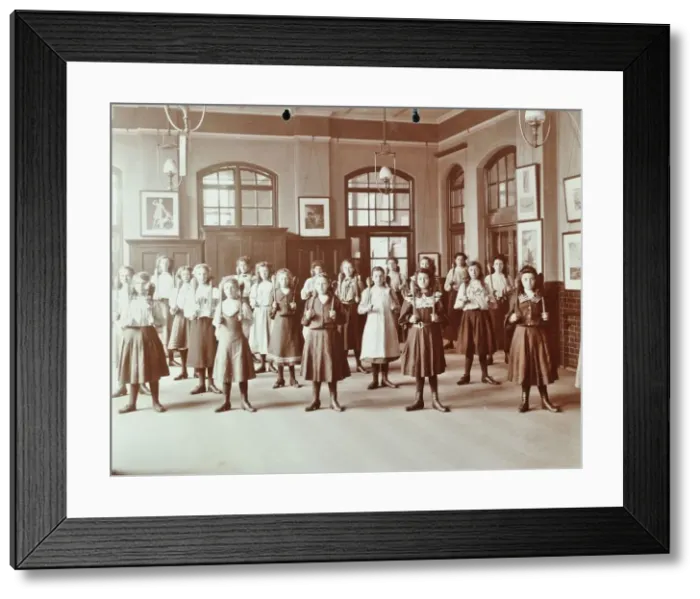 Framed Print : Girls holding Indian clubs, Cromer Street School / Argyle School, St Pancras, London, 1906 Framed Print : Girls holding Indian clubs, Cromer Street School / Argyle School, St Pancras, London, 1906