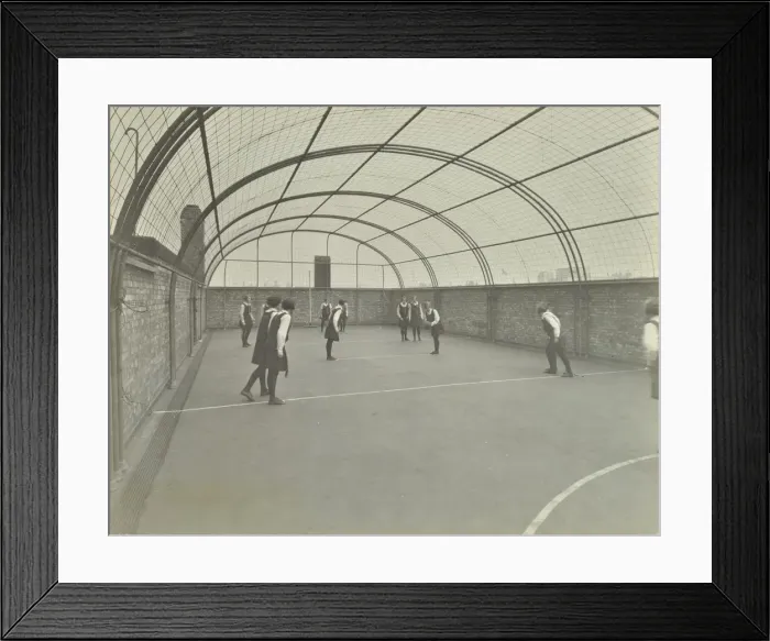 Framed Print : Girls playing netball on a roof playground, Barrett Street Trade School, London, 1927 Framed Print : Girls playing netball on a roof playground, Barrett Street Trade School, London, 1927