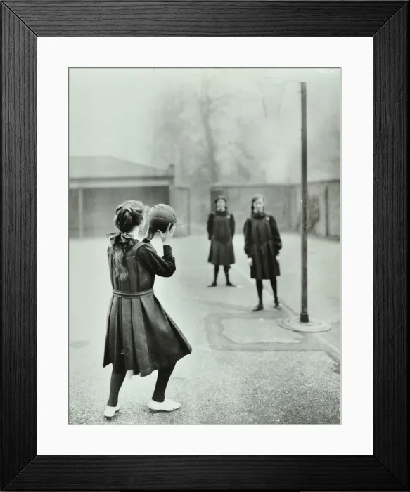 Framed Print : Girls playing netball, Chelsea Secondary School (Hortensia Road School), London, 1911 Framed Print : Girls playing netball, Chelsea Secondary School (Hortensia Road School), London, 1911