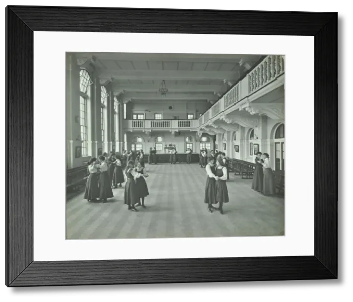 Framed Print : Girls dancing in the assembly hall, Clapham Secondary School, London, 1910 Framed Print : Girls dancing in the assembly hall, Clapham Secondary School, London, 1910