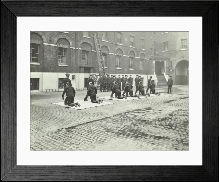 Framed Print : Demonstrating how to pick up an unconscious person, London Fire Brigade Headquarters, London, 1910 Framed Print : Demonstrating how to pick up an unconscious person, London Fire Brigade Headquarters, London, 1910