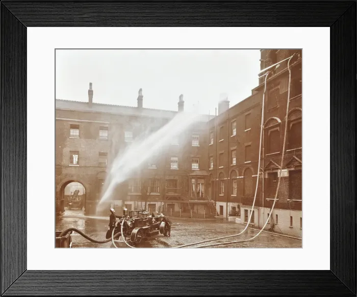 Framed Print : Firemen demonstrating hoses worked by a petrol motor pump, London Fire Brigade Headquarters, 1909 Framed Print : Firemen demonstrating hoses worked by a petrol motor pump, London Fire Brigade Headquarters, 1909