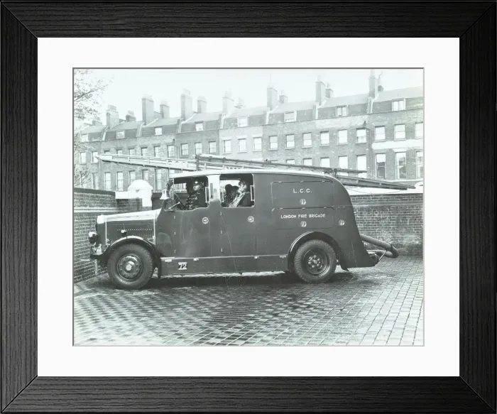Framed Print : Firemen inside a fire engine, Kingsland Road Fire Station, London, 1935 Framed Print : Firemen inside a fire engine, Kingsland Road Fire Station, London, 1935