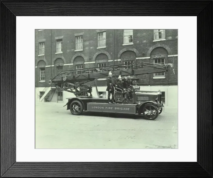 Framed Print : Firemen aboard a fire engine, London Fire Brigade Headquarters, London, 1929 Framed Print : Firemen aboard a fire engine, London Fire Brigade Headquarters, London, 1929