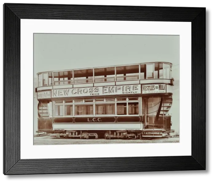 Framed Print : Double-decker electric tram with advertisement for the New Cross Empire, 1907 Framed Print : Double-decker electric tram with advertisement for the New Cross Empire, 1907
