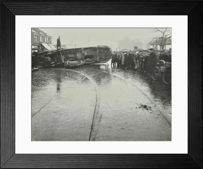 Framed Print : Overturned electric tram and onlookers, London, 1913 Framed Print : Overturned electric tram and onlookers, London, 1913