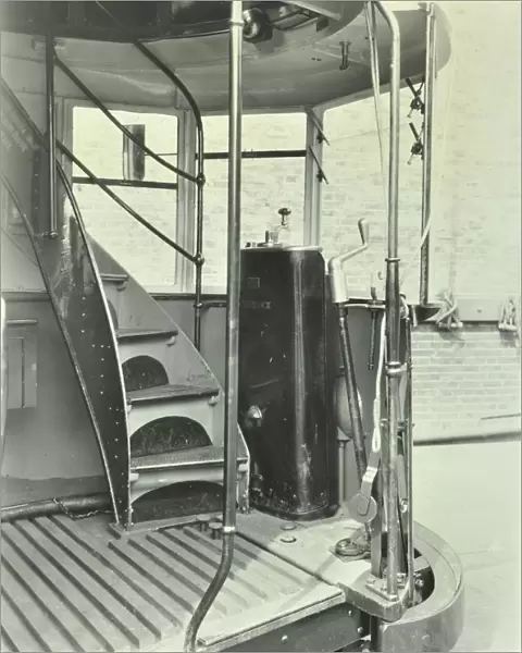 Interior of an electric tram showing driver controls, 1931