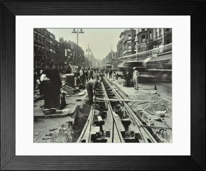 Framed Print : Men laying tramlines in the middle of the road, Whitechapel High Street, London, 1929 Framed Print : Men laying tramlines in the middle of the road, Whitechapel High Street, London, 1929