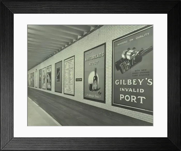 Framed Print : Advertisements for beer and port, Holborn Underground Tram Station, London, 1931 Framed Print : Advertisements for beer and port, Holborn Underground Tram Station, London, 1931