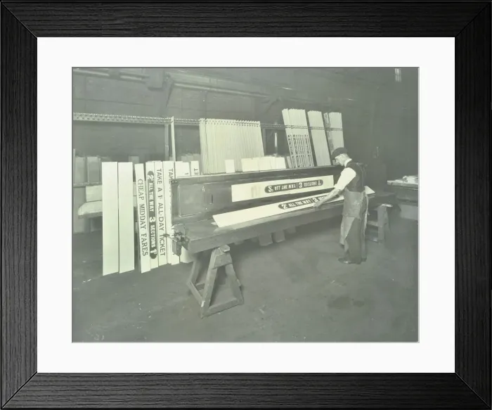 Framed Print : Man stencilling signs for tram cars at Charlton Central Repair Depot, London, 1932 Framed Print : Man stencilling signs for tram cars at Charlton Central Repair Depot, London, 1932