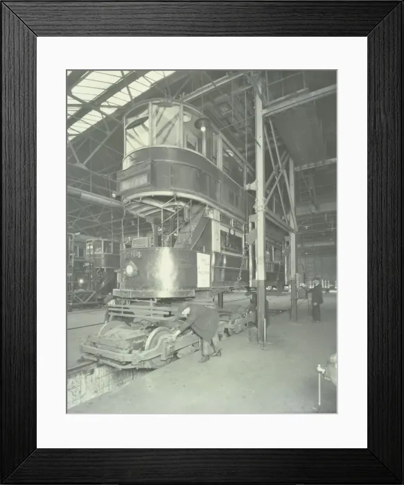 Framed Print : Men using a car lifting hoist at Charlton Central Repair Depot, London, 1932 Framed Print : Men using a car lifting hoist at Charlton Central Repair Depot, London, 1932