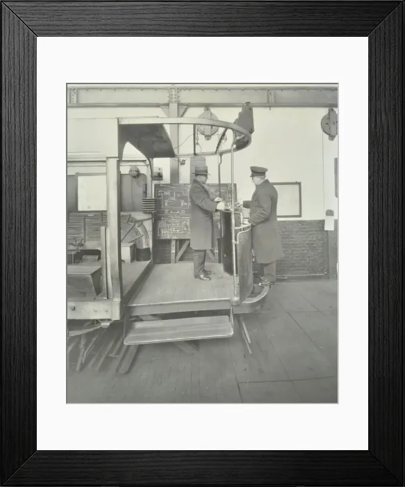 Framed Print : Learner-driver under instruction in a mock-up of tram car cab, London, 1932 Framed Print : Learner-driver under instruction in a mock-up of tram car cab, London, 1932